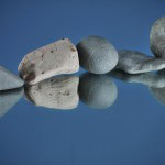stones-on-a-mirror